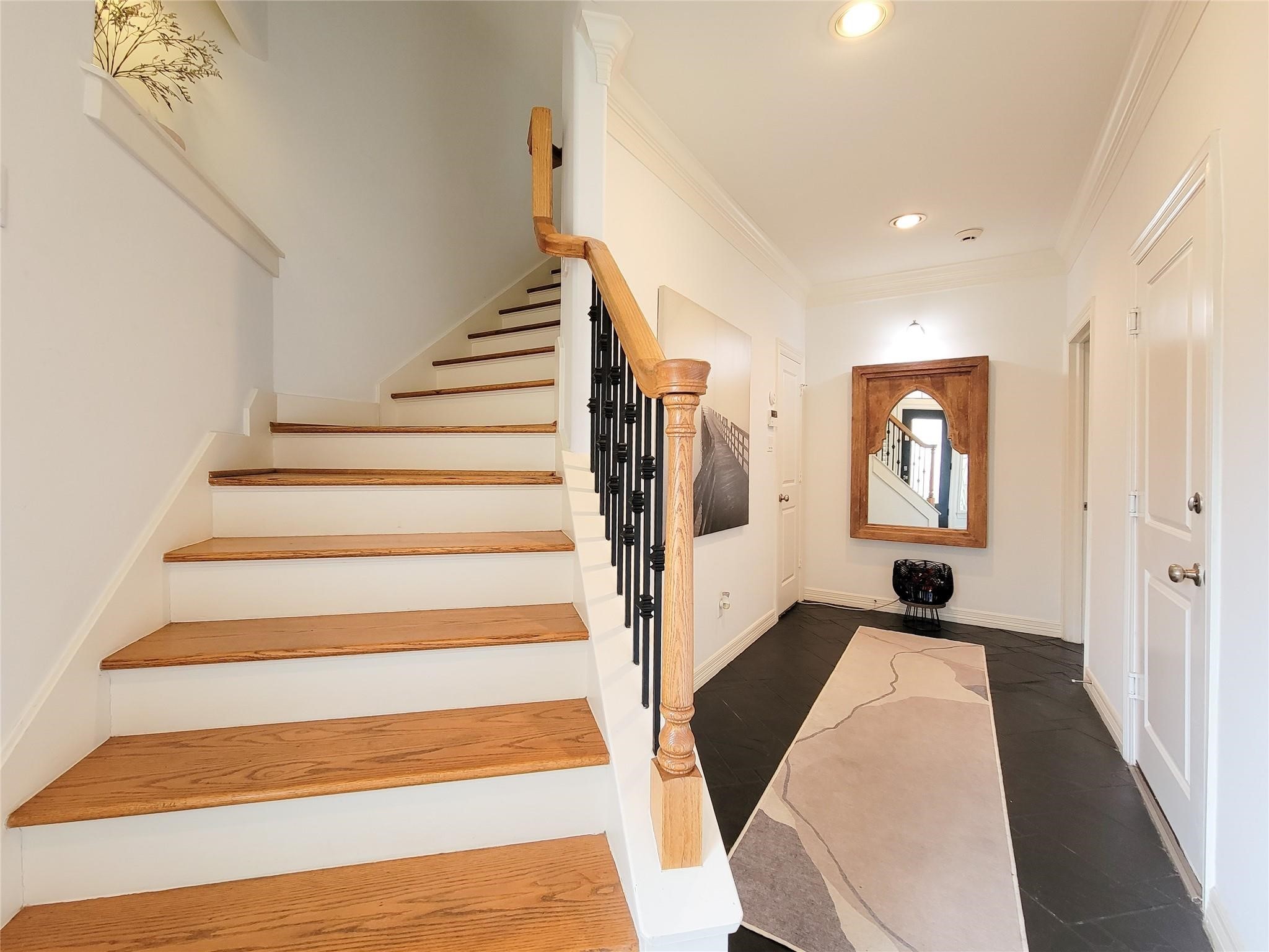1421 Bremond Street Houston, TX 77004 - Photo 15 of 30 a view of entryway and hall with wooden floor