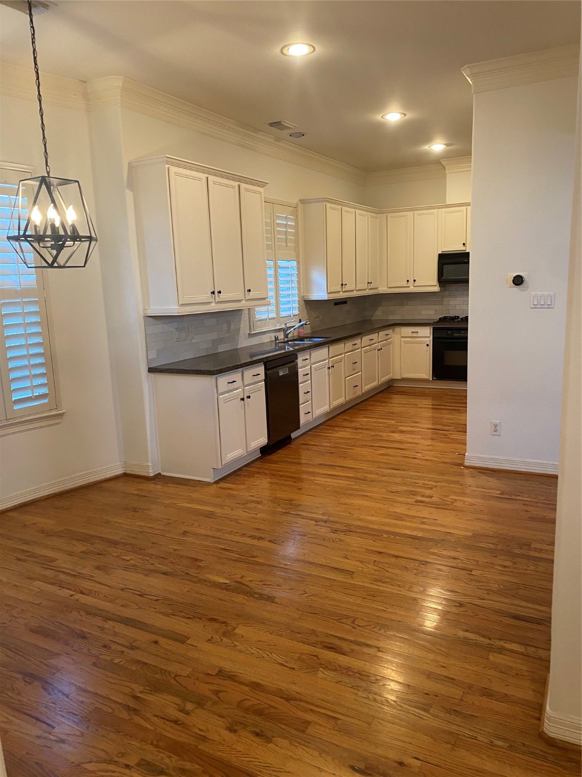 1421 Bremond Street Houston, TX 77004 - Photo 21 of 30 a large kitchen with stainless steel appliances granite countertop a large counter top and a stove