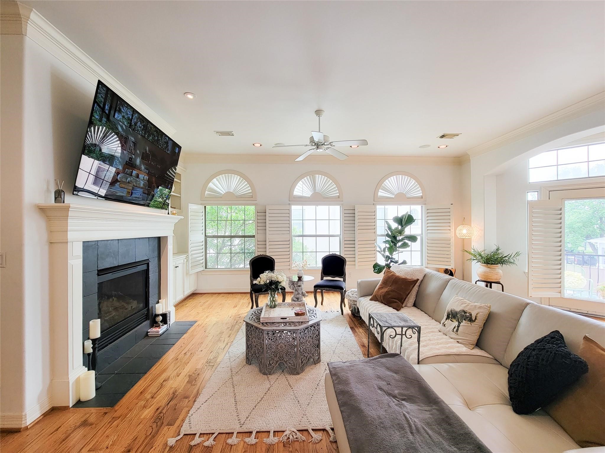 1421 Bremond Street Houston, TX 77004 - Photo 8 of 30 a living room with fireplace furniture and a fireplace