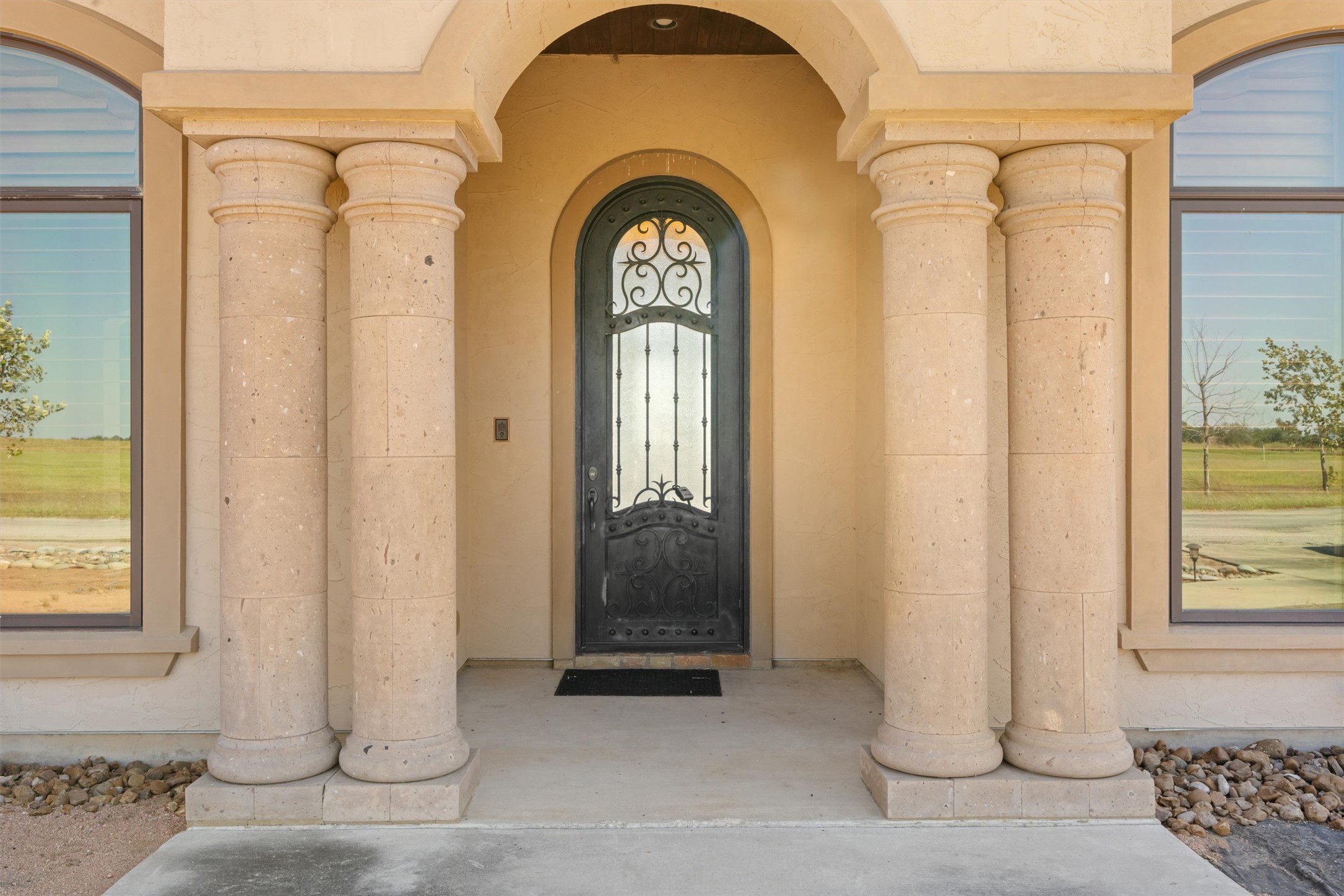 14502 Lund - Carlson Road Coupland, TX 78615 - Photo 2 of 40 Grand stone entry with heavy metal door
