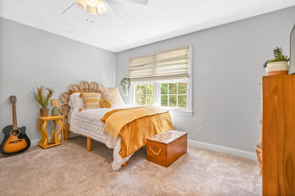 50 Rocky Brook Road North Andover, MA 01845 - Photo 25 of 42 a spacious bedroom with a bed and a window