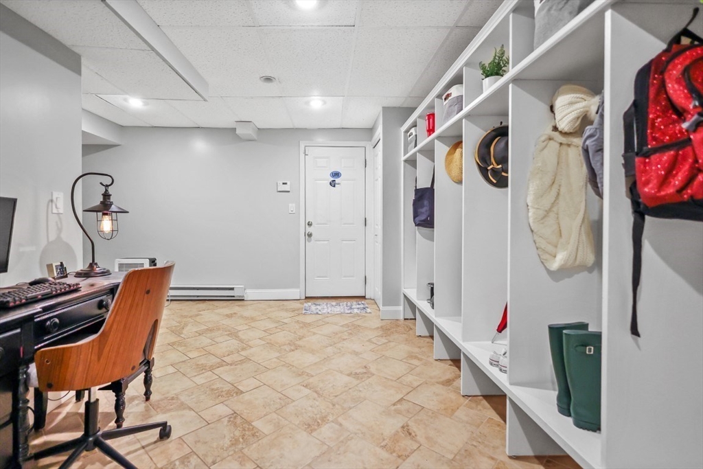 50 Rocky Brook Road North Andover, MA 01845 - Photo 28 of 42 a view of a hallway with paintings on the wall