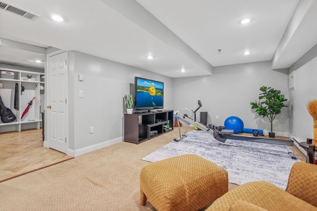 50 Rocky Brook Road North Andover, MA 01845 - Photo 29 of 42 a room with furniture and a potted plant