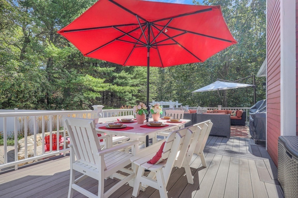 50 Rocky Brook Road North Andover, MA 01845 - Photo 30 of 42 a view of deck with furniture and barbeque oven in the backyard