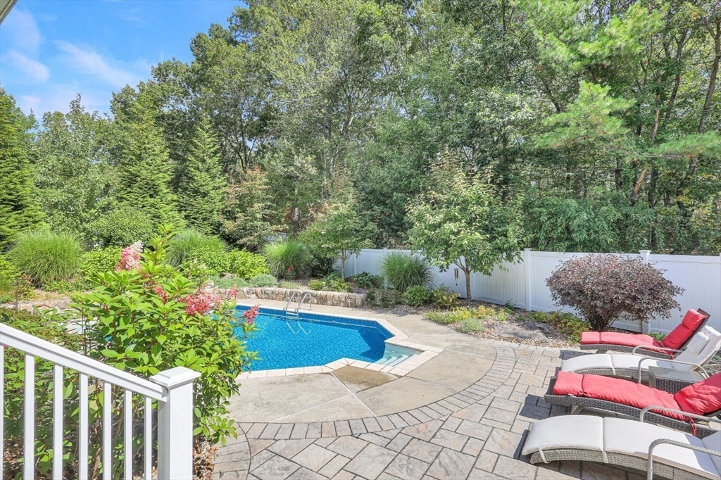 50 Rocky Brook Road North Andover, MA 01845 - Photo 32 of 42 a view of a backyard with sitting area