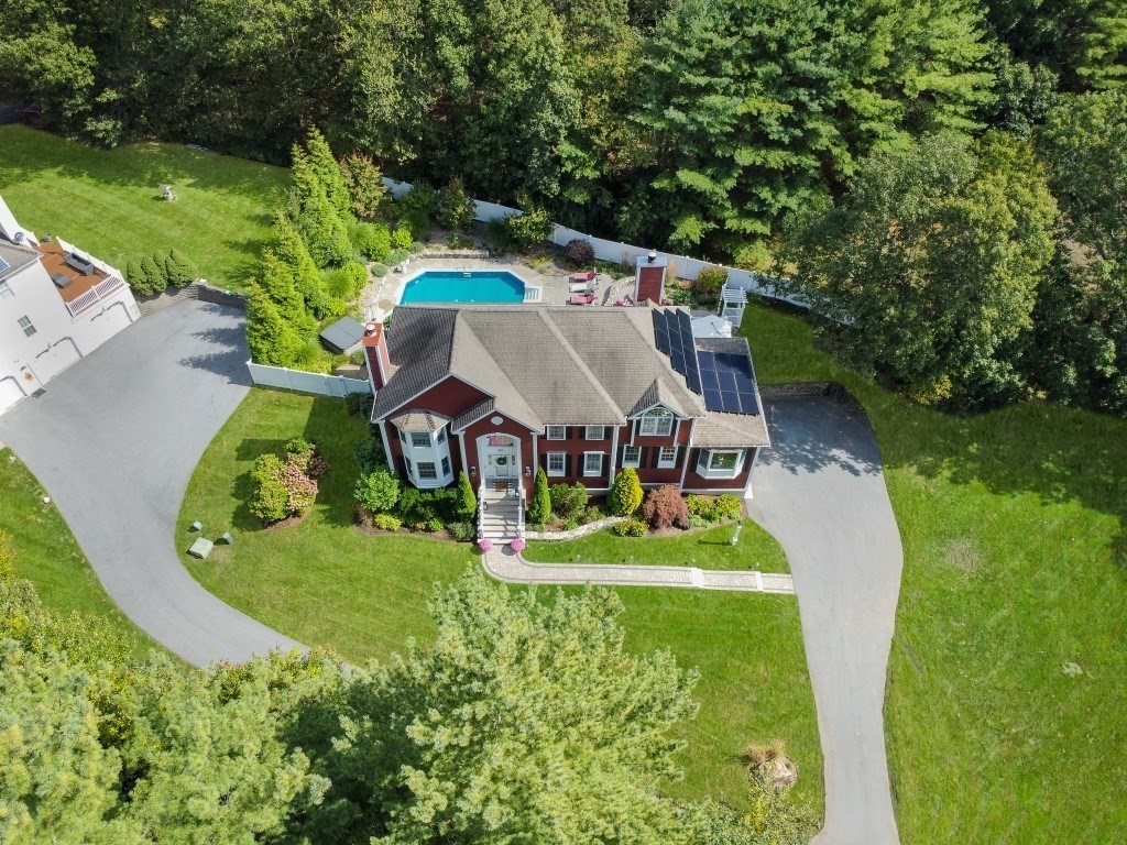 50 Rocky Brook Road North Andover, MA 01845 - Photo 41 of 42 an aerial view of a house with a yard table and chairs