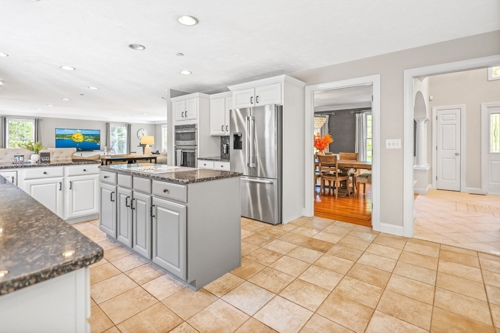 50 Rocky Brook Road North Andover, MA 01845 - Photo 5 of 42 a kitchen with stainless steel appliances granite countertop a refrigerator and a sink