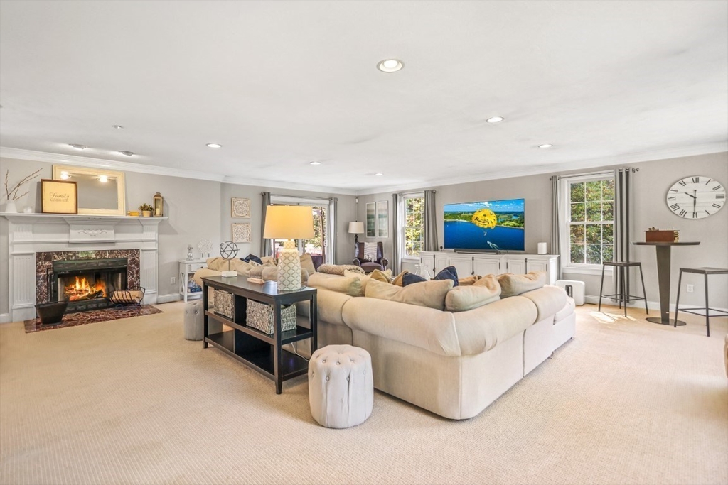 50 Rocky Brook Road North Andover, MA 01845 - Photo 7 of 42 a living room with furniture and a fireplace