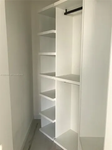 a view of a swimming pool and an outdoor space