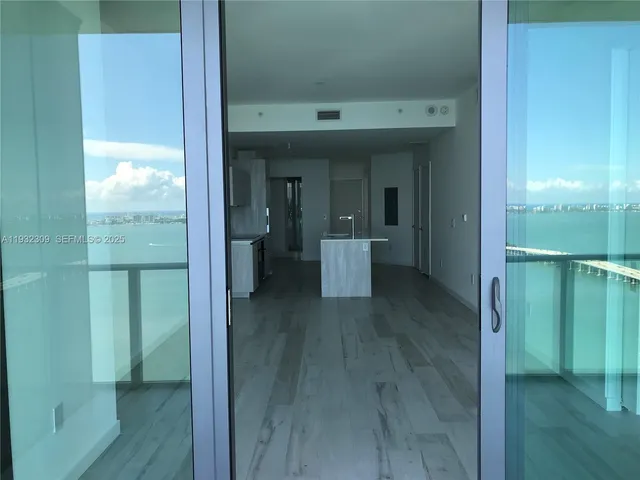 a view of a bathroom from the hallway