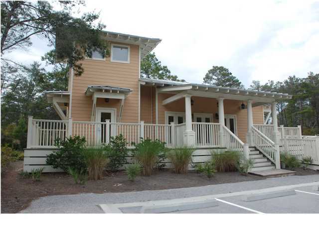 42 Matt's Way Santa Rosa Beach, FL 32459 - Photo 3 of 5 a front view of a house with a yard and garage