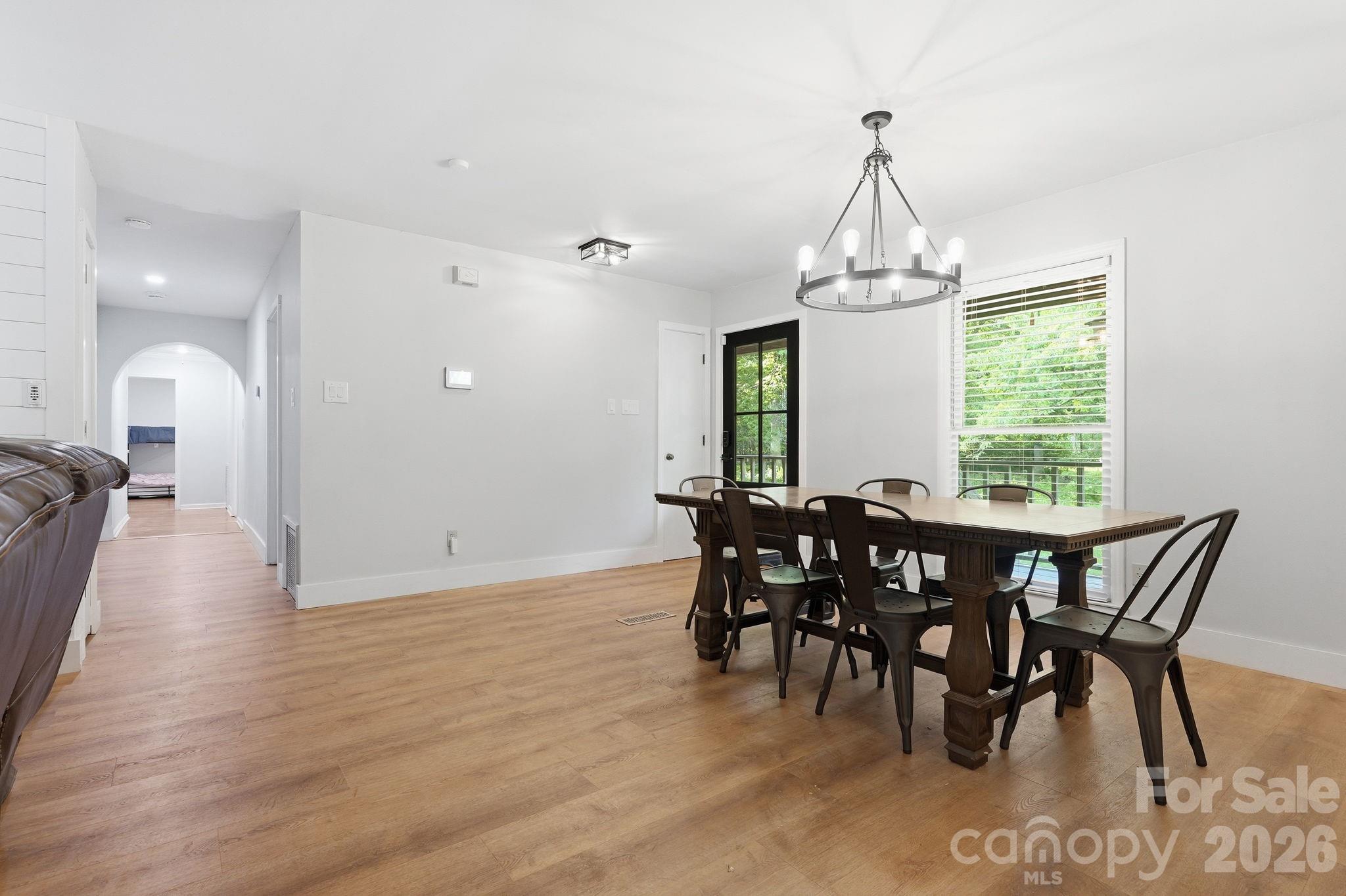 5347 Haney Road York, SC 29745 - Photo 11 of 39 a view of a dining room with furniture window and wooden floor
