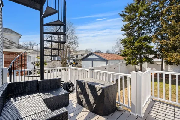 a view of a roof deck with couches