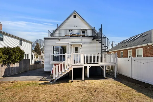 a view of a house with a roof deck