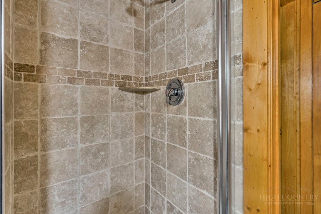 233 Cherry Drive Boone, NC 28607 - Photo 15 of 20 a bathroom with a shower