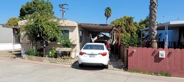 a car parked in front of a building
