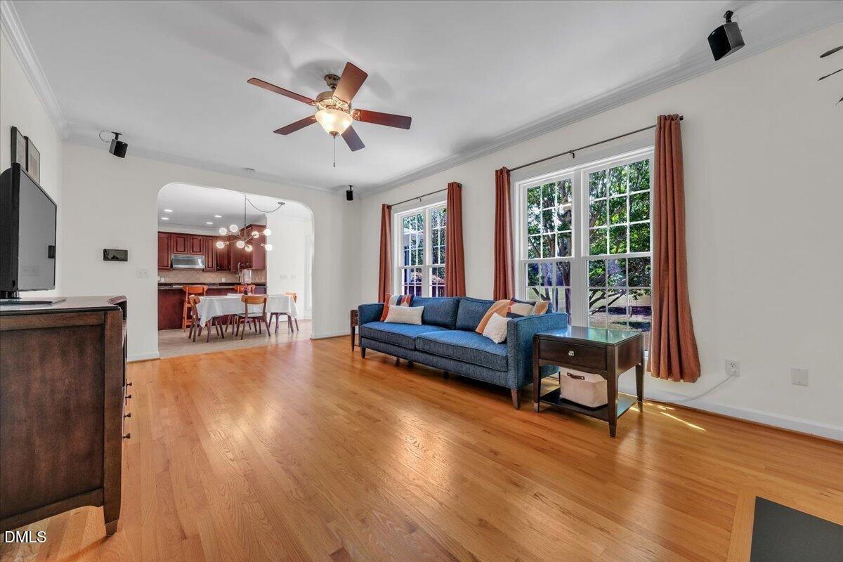 2908 Oak Bridge Drive Raleigh, NC 27610 - Photo 21 of 47 a living room with furniture and a large window