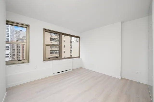 an empty room with windows