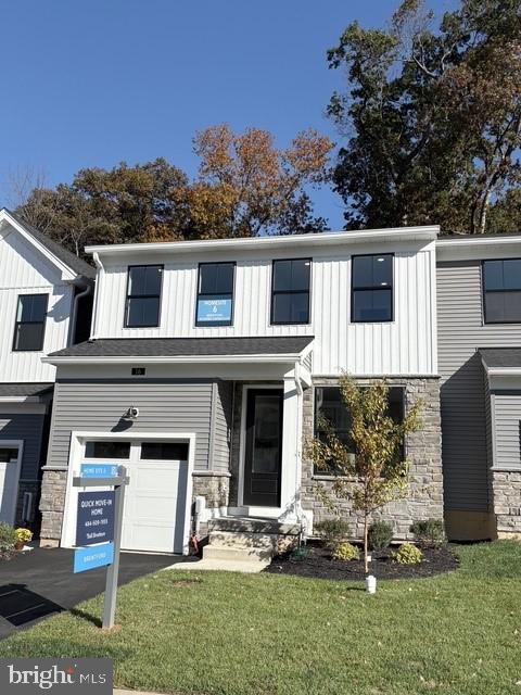 16 Grayson Lane Downingtown, PA 19335 - Photo 2 of 18 front view of a house with a yard