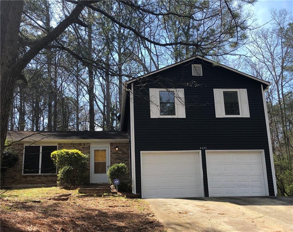 a front view of house with yard