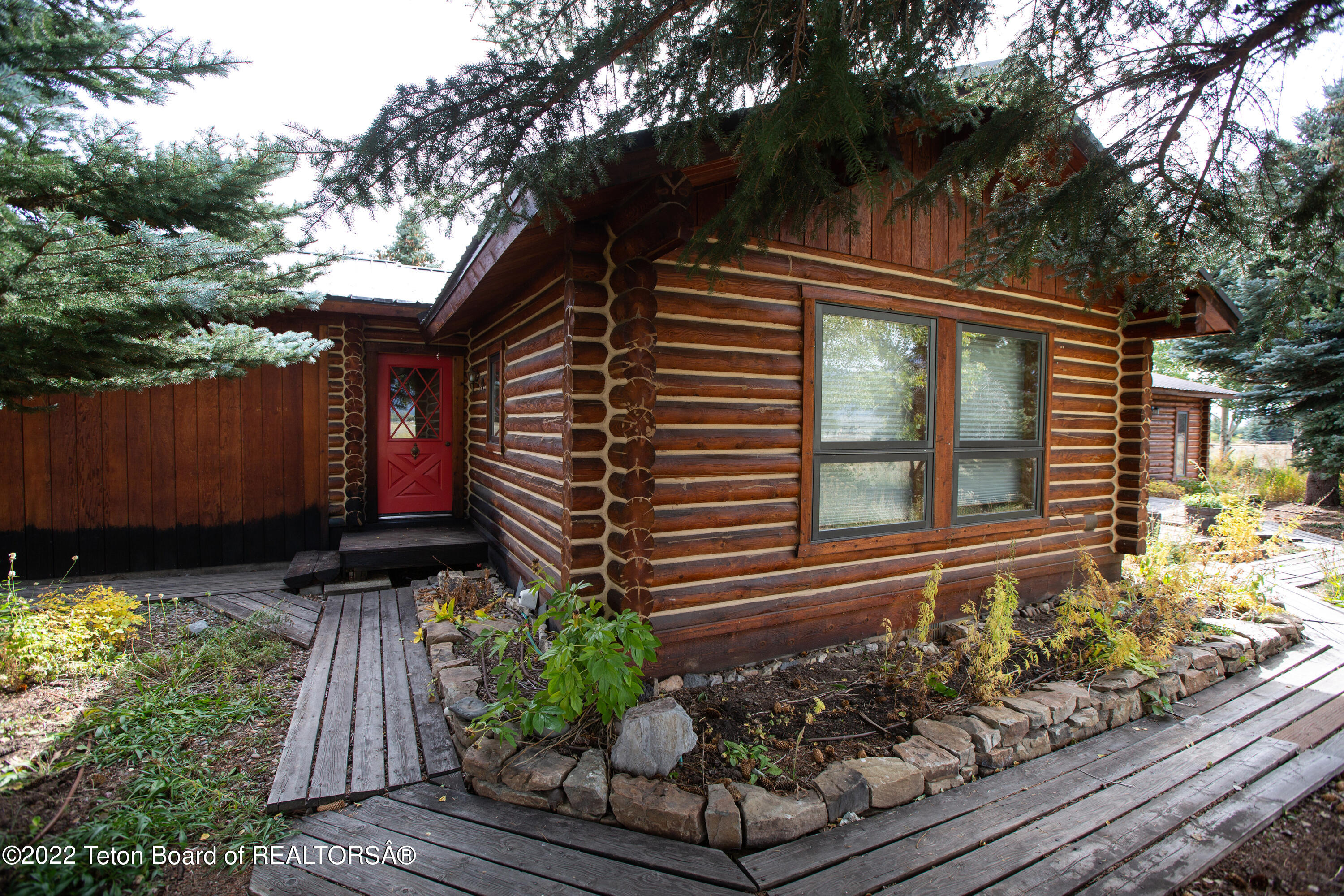 7655 North Roberta Drive Jackson, WY 83001 - Photo 1 of 1 4 Deck Walkway Better_MLS
