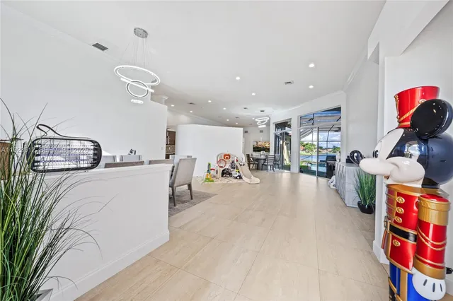 a room with furniture and a flat tv screen