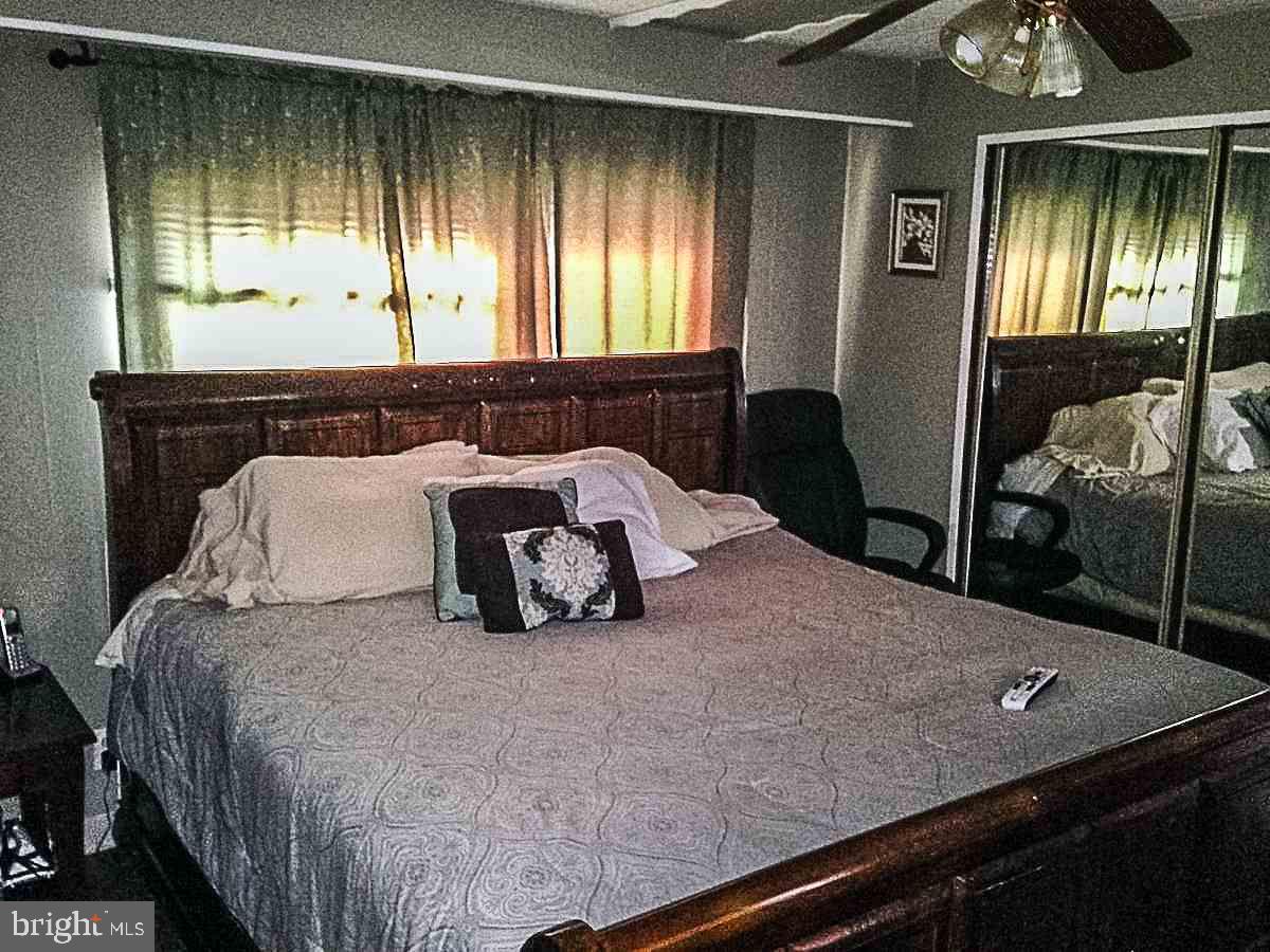 1347 Pine Grove Road Hanover, PA 17331 - Photo 12 of 18 a bedroom with a bed and a mirror