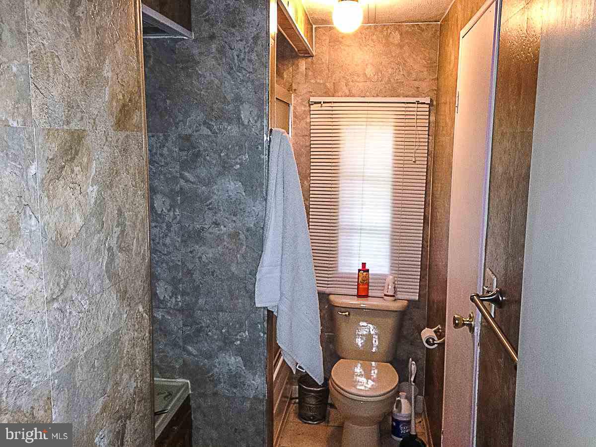 1347 Pine Grove Road Hanover, PA 17331 - Photo 13 of 18 a bathroom with a toilet and a shower