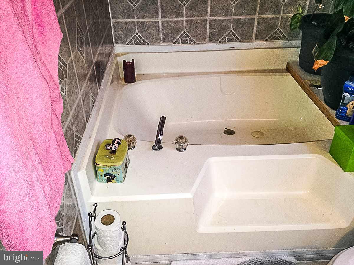 1347 Pine Grove Road Hanover, PA 17331 - Photo 14 of 18 a bathroom with a bathtub