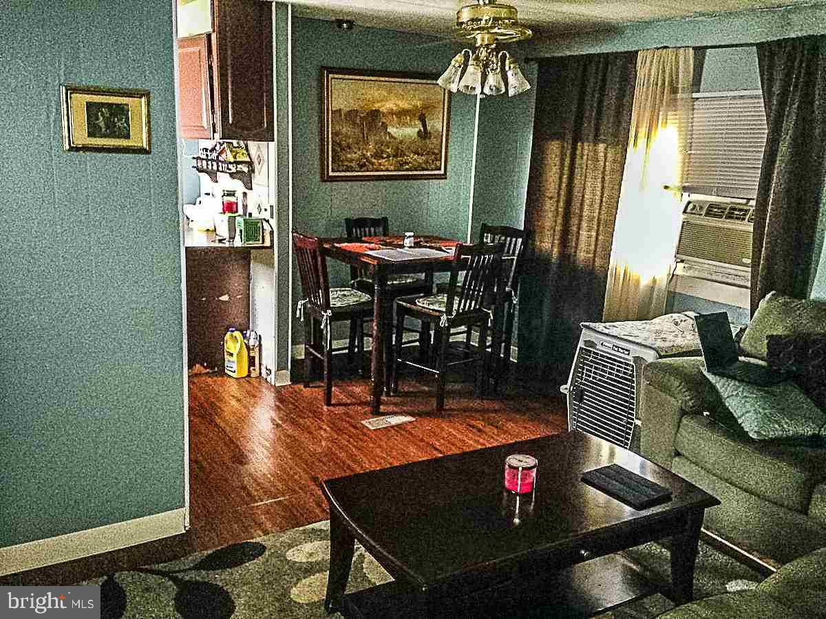 1347 Pine Grove Road Hanover, PA 17331 - Photo 8 of 18 a living room with furniture and a chandelier