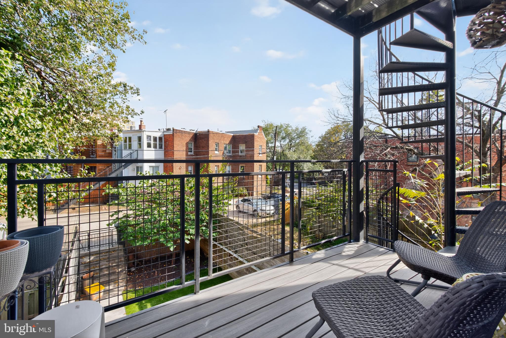 3911 Kansas Avenue Northwest, Unit 2 Washington, DC 20011 - Photo 19 of 46 a balcony with with outdoor seating