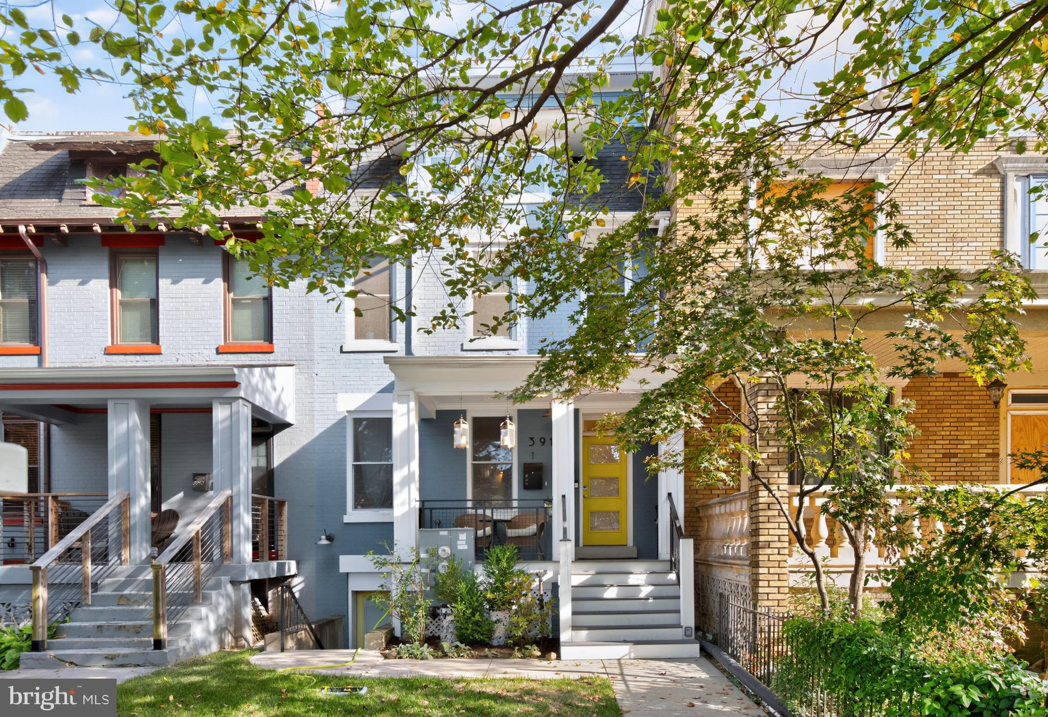 3911 Kansas Avenue Northwest, Unit 2 Washington, DC 20011 - Photo 2 of 46 a front view of a house with garden