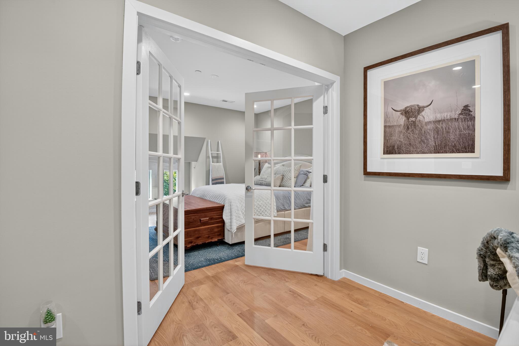 3911 Kansas Avenue Northwest, Unit 2 Washington, DC 20011 - Photo 26 of 46 a bedroom with furniture and a window