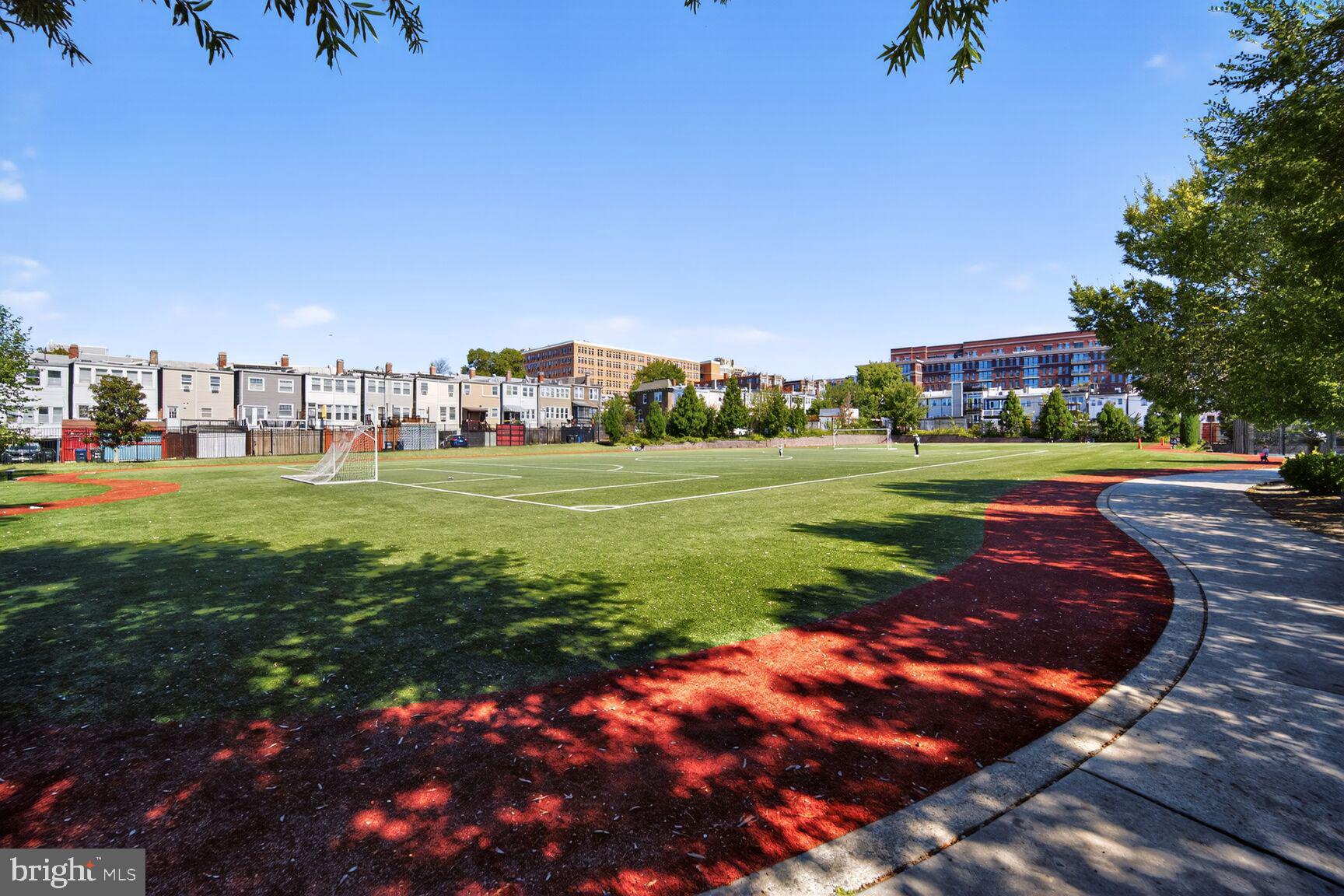 3911 Kansas Avenue Northwest, Unit 2 Washington, DC 20011 - Photo 41 of 46 a view of a grassy field with trees