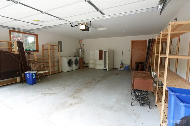 a view of house with backyard and outdoor seating