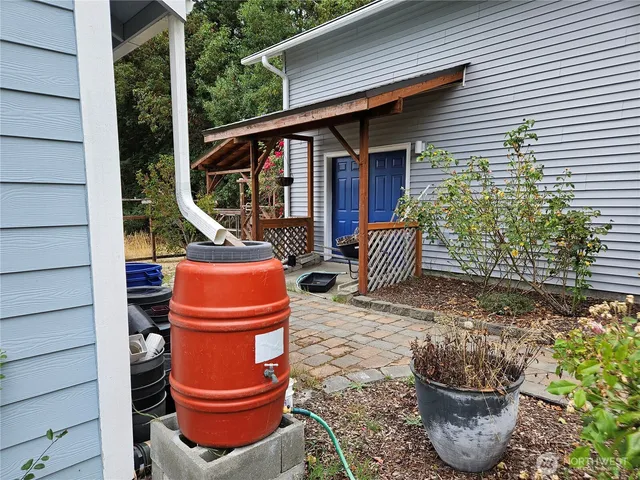 a backyard of a house with lots of green space