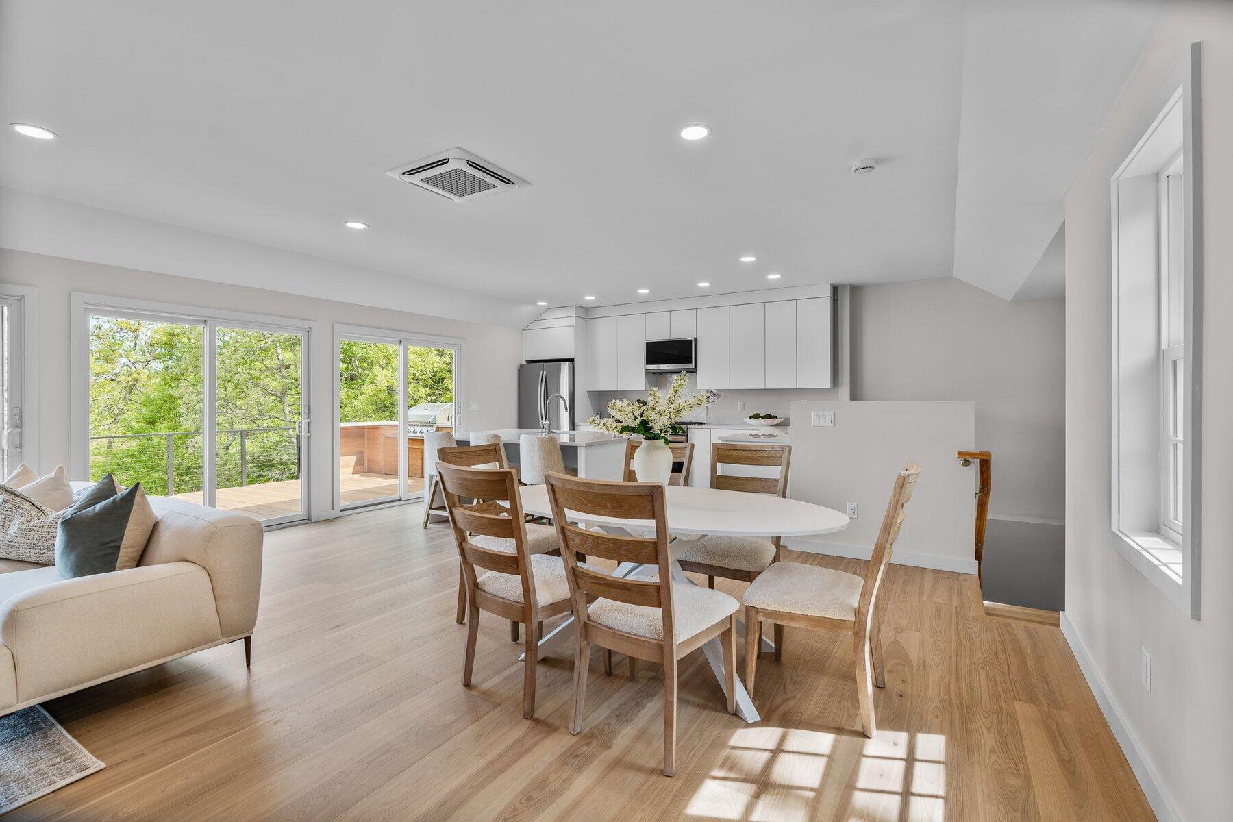 162 Main Street Osterville, MA 02655 - Photo 7 of 50 a view of a dining room with furniture window and wooden floor