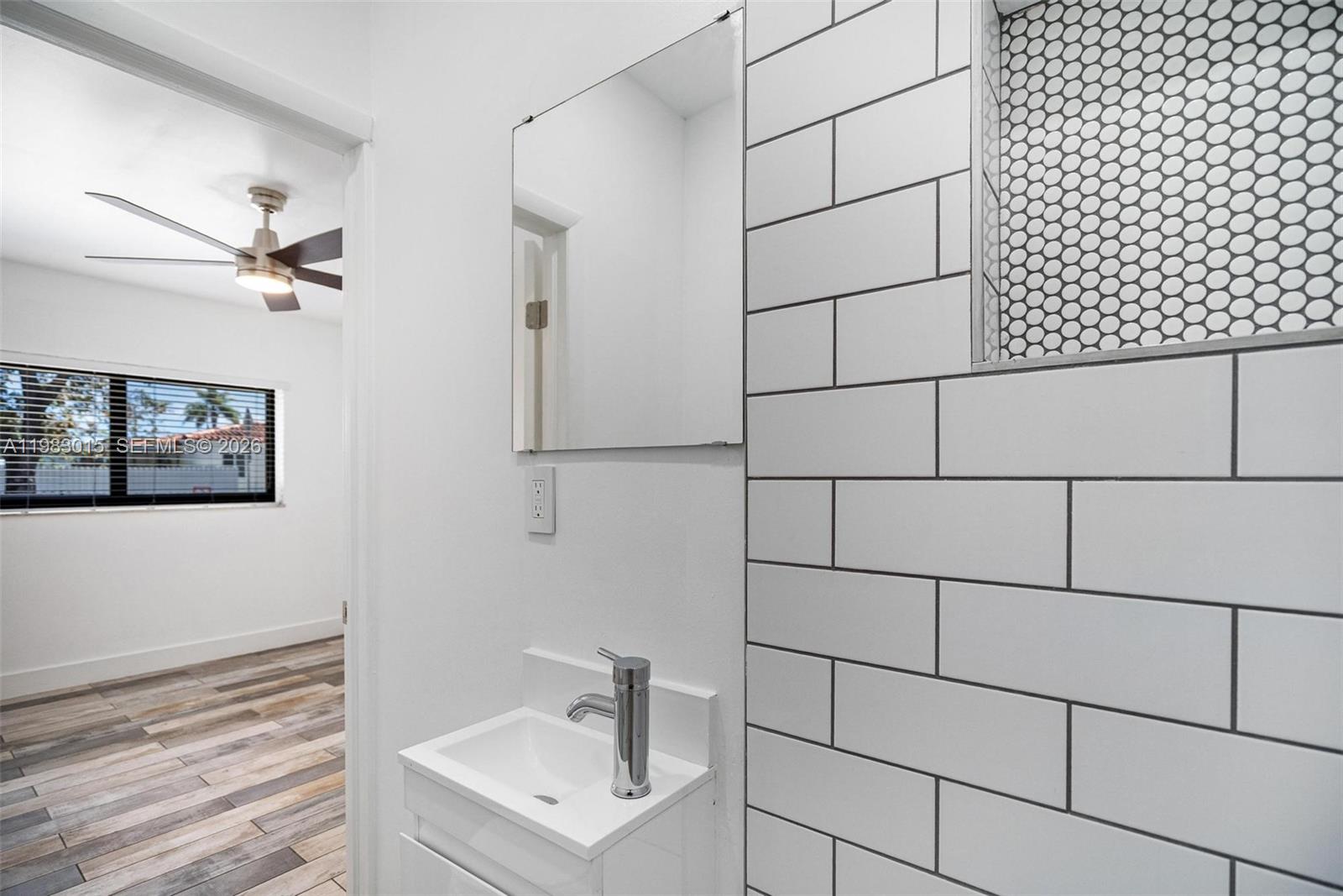 180 Southwest 63rd Avenue Miami, FL 33144 - Photo 13 of 15 a bathroom with a shower and a sink