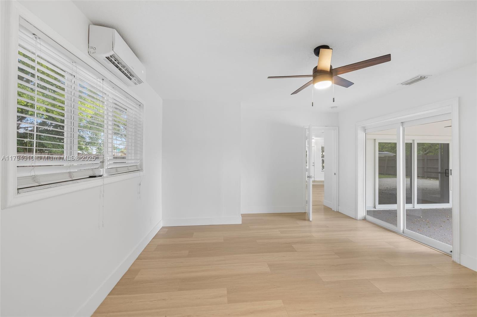 4401 Madison Street Hollywood, FL 33021 - Photo 13 of 27 a view of an empty room with a window