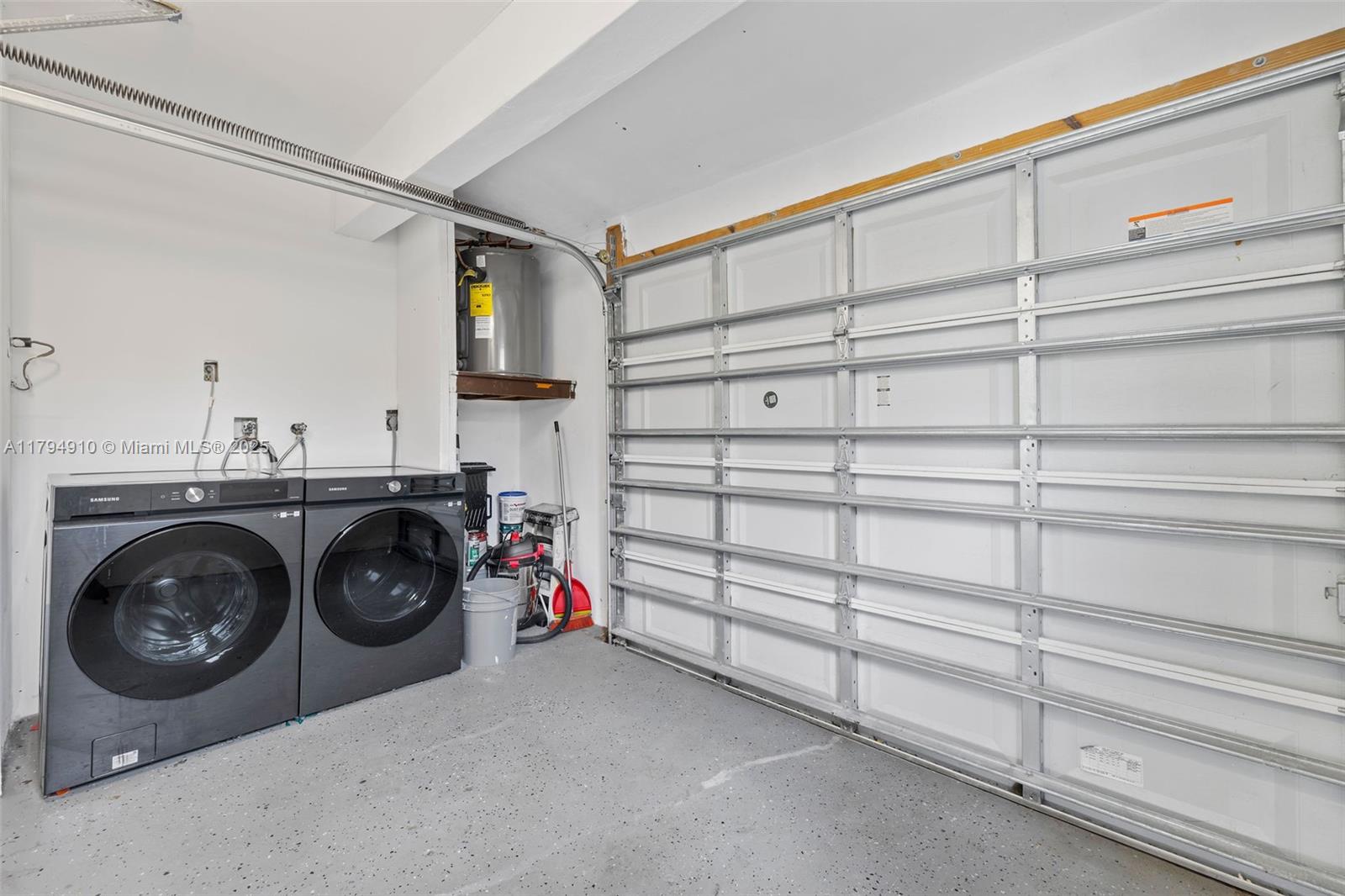4401 Madison Street Hollywood, FL 33021 - Photo 25 of 27 a utility room with dryer and washer
