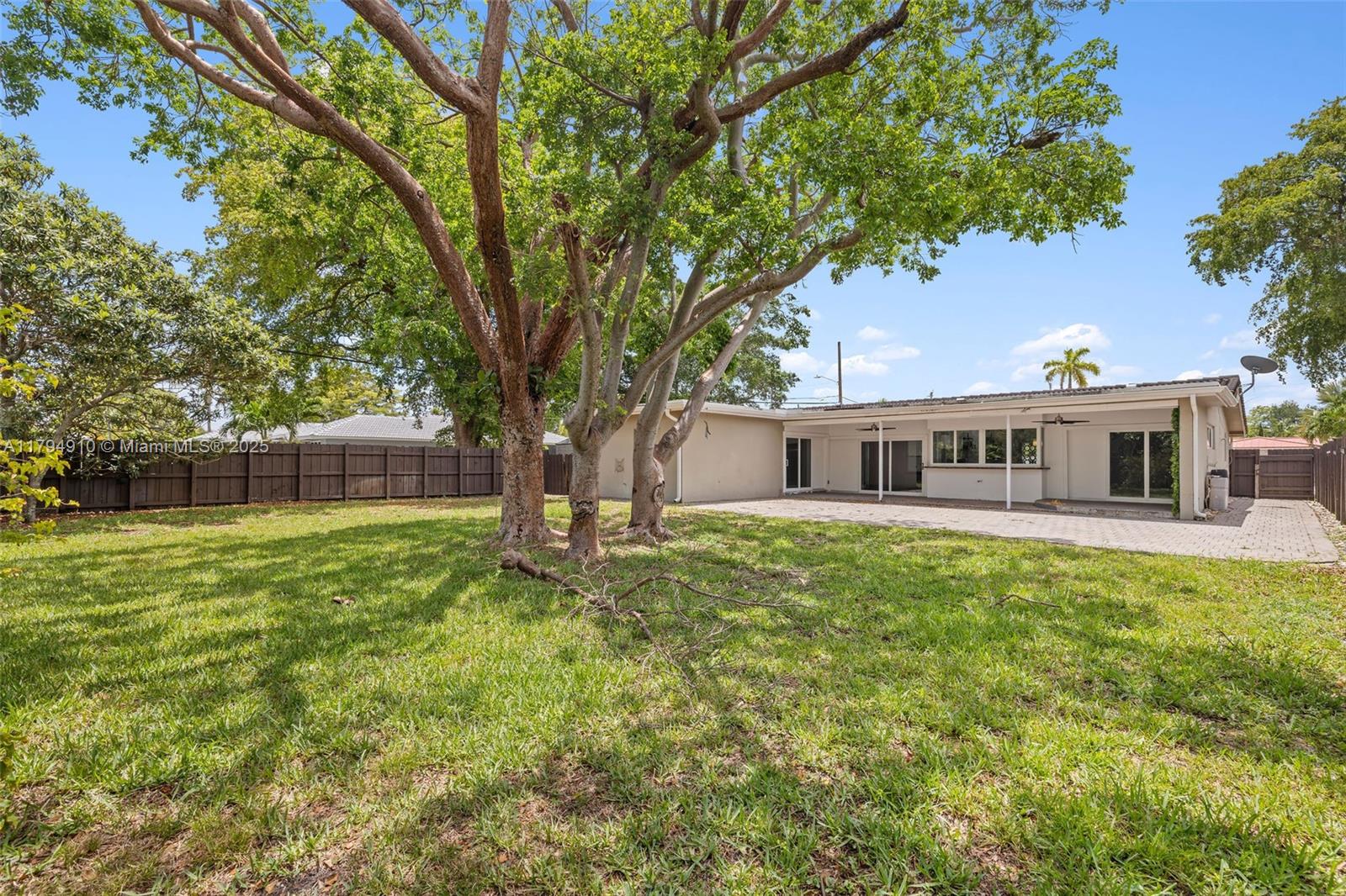 4401 Madison Street Hollywood, FL 33021 - Photo 26 of 27 a front view of a house with garden
