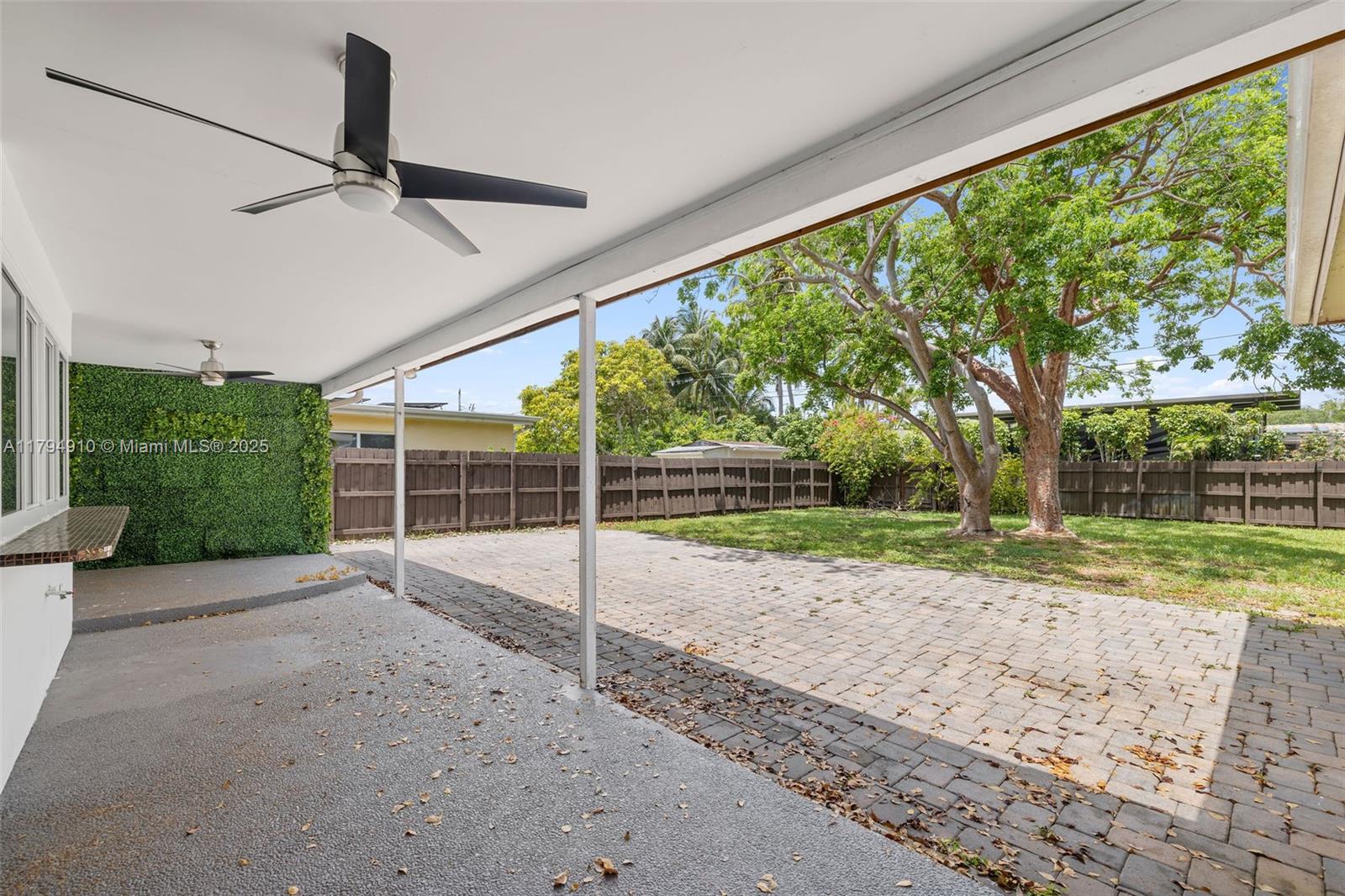 4401 Madison Street Hollywood, FL 33021 - Photo 9 of 27 a view of a yard with porch