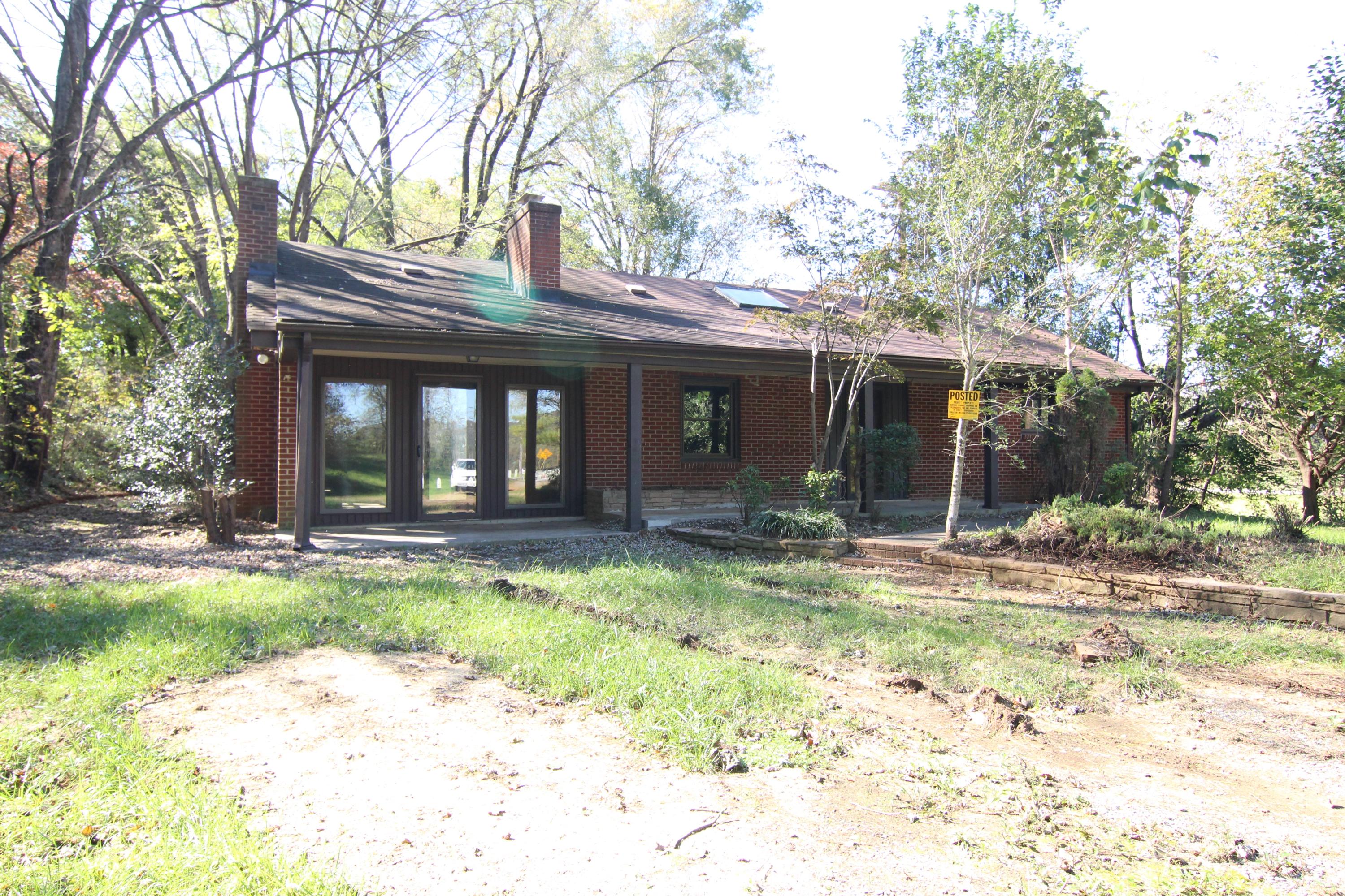 5474 Blue Ridge Boulevard Blue Ridge, VA 24064 - Photo 2 of 22 a view of a house with backyard porch and sitting area