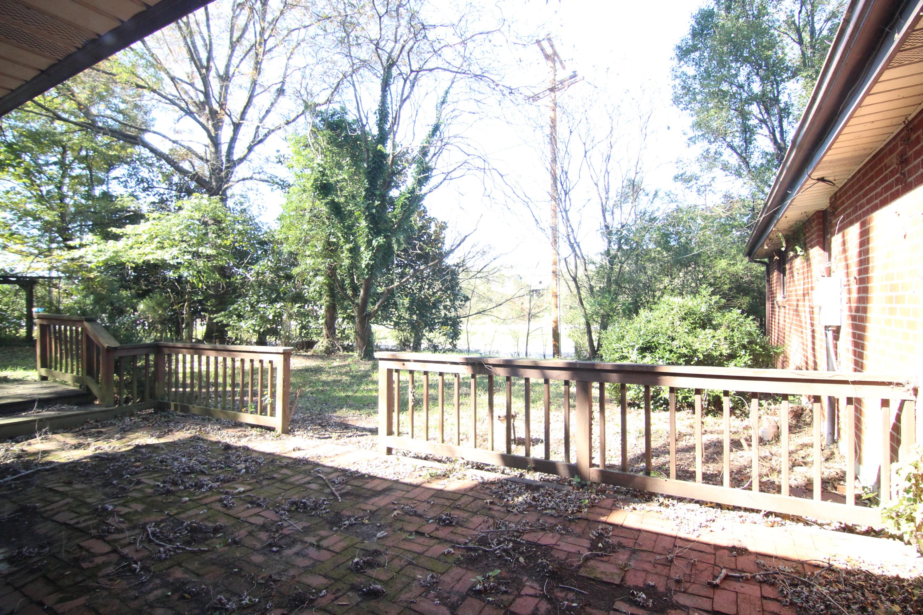 5474 Blue Ridge Boulevard Blue Ridge, VA 24064 - Photo 22 of 22 a view of a house with backyard and trees