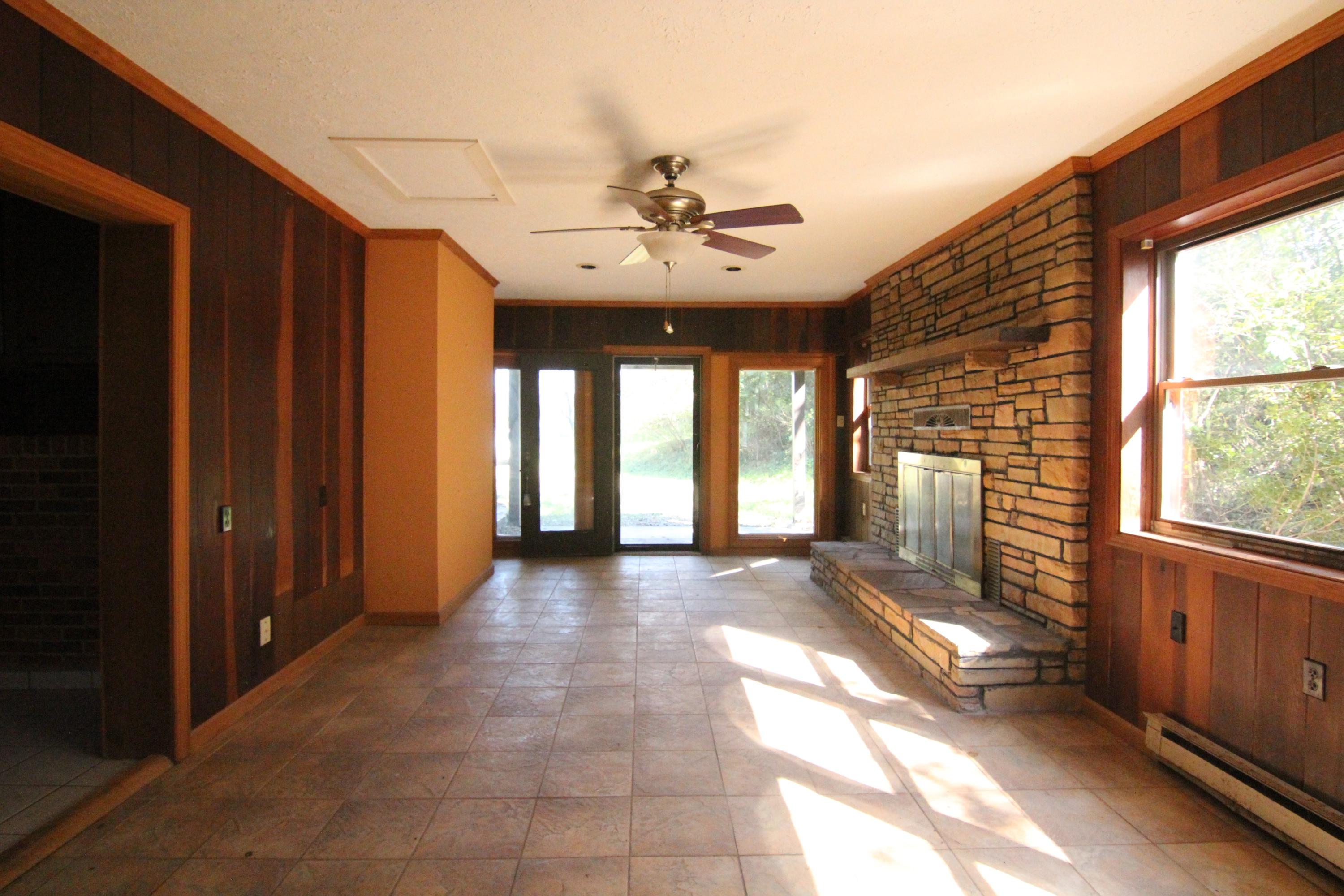 5474 Blue Ridge Boulevard Blue Ridge, VA 24064 - Photo 6 of 22 a view of hallway with windows and chandelier