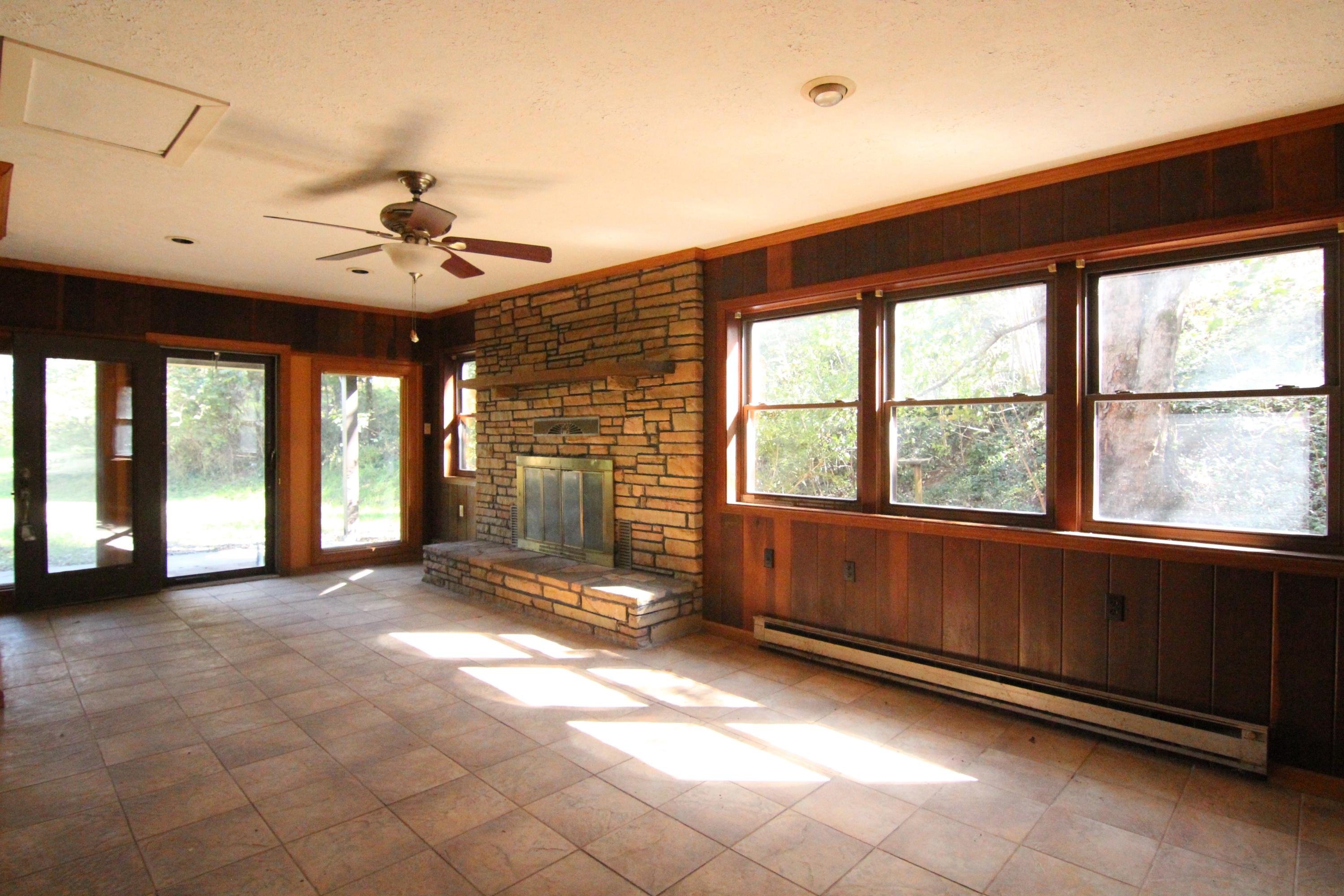 5474 Blue Ridge Boulevard Blue Ridge, VA 24064 - Photo 7 of 22 a view of livingroom with furniture and windows