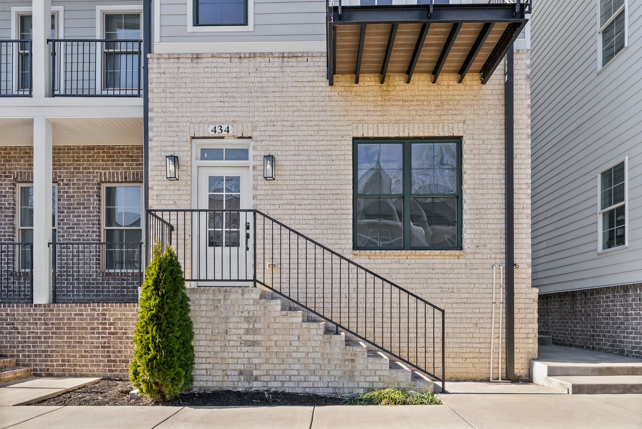 434 Centre Street Pleasant View, TN 37146 - Photo 1 of 44 a view of a brick house with large windows