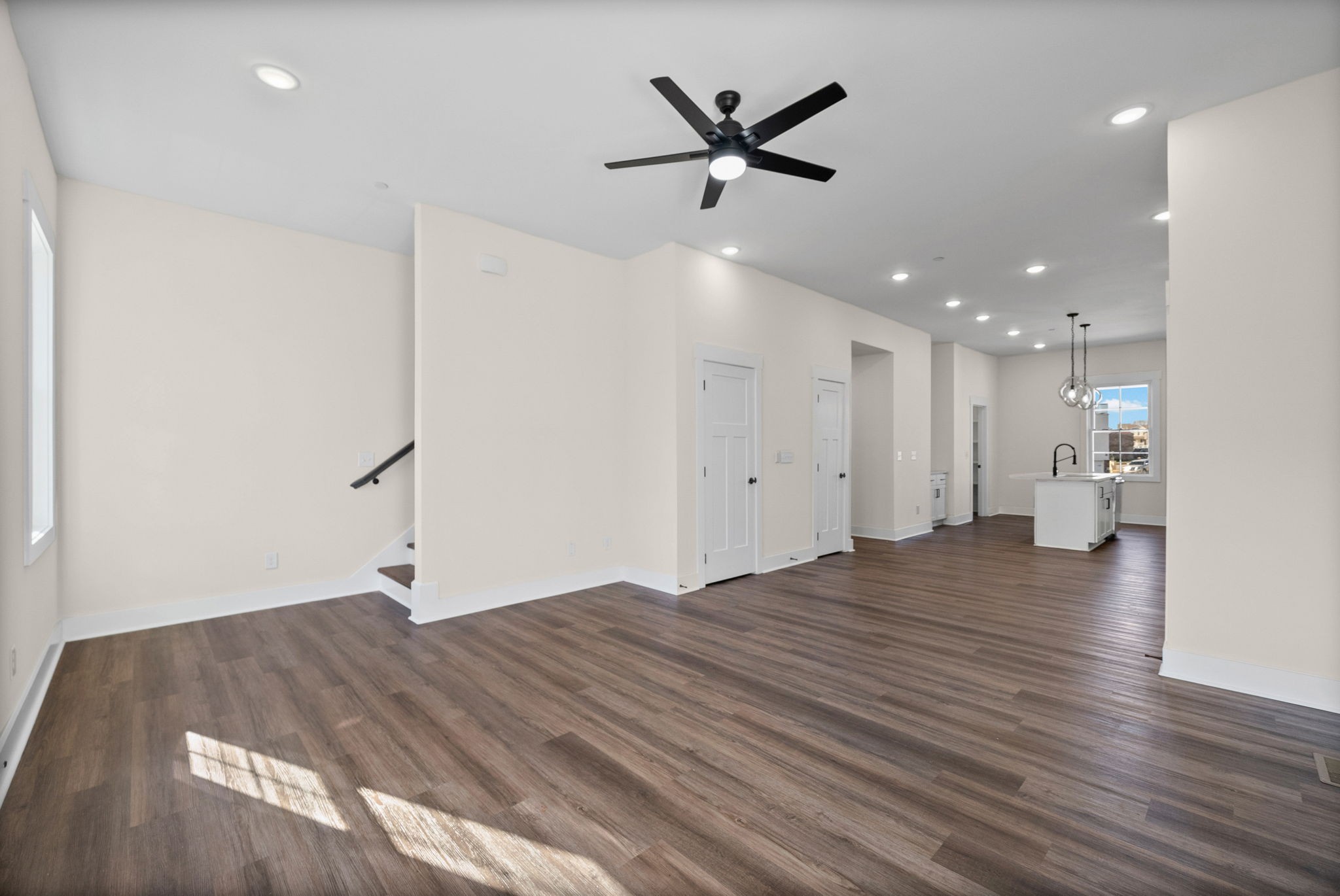 434 Centre Street Pleasant View, TN 37146 - Photo 13 of 44 a view of a livingroom with a ceiling fan wooden floor and a ceiling fan