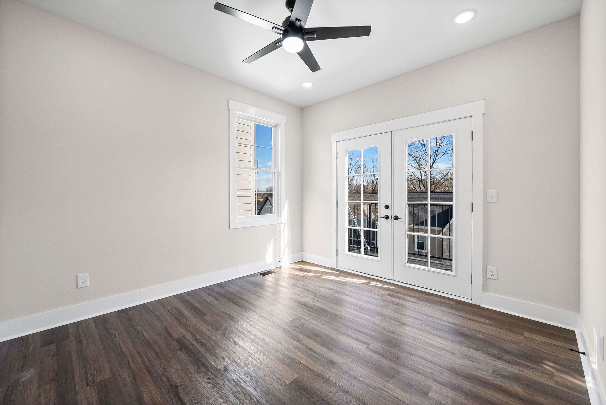 434 Centre Street Pleasant View, TN 37146 - Photo 25 of 44 a view of a livingroom with wooden floor and a ceiling fan