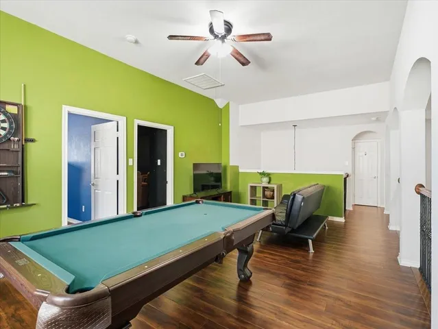 a bathroom with a tub and shower